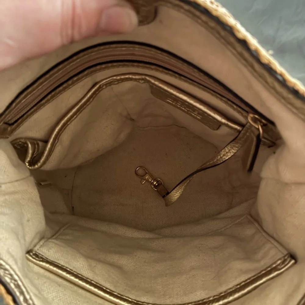 Vintage Michael Kors Tan Woven Crossbody with Gold MK Charm and drawstring bag.